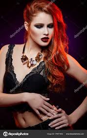 bright makeup and red hair stock photo