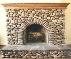 the stacked stone fireplace