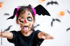 child wearing halloween costumes