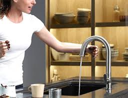 touchless kitchen faucets and hands