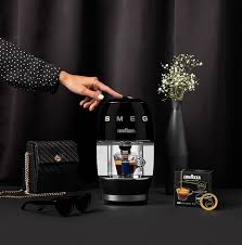 Coffee machine capsule sizes actuality in a sentence. A Modo Mio Smeg Espresso Coffee Machine Lavazza