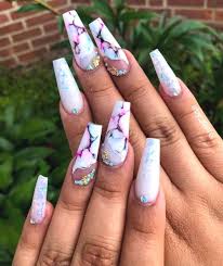 Marble nail designs not only look fantastic, but they are also pretty easy to make because all you have to do is dip your nails into a water bowl that has floating nail polish. Marble Nailideas