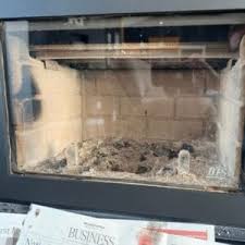 how to clean fireplace glass