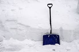 Shovel buried in the snow