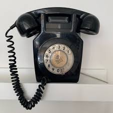 Vintage Wall Mounted Black Telephone In