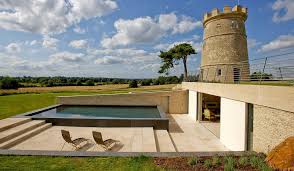 Searching for the latest updates of the global real estate market? The Round Tower Former Folly Is Now A Spectacular Cotswolds Home With Swimming Pool And Servants Annex On Sale For 1 75 Million Homes And Property Evening Standard