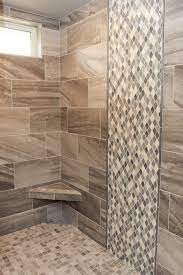 brown and beige tile shower wall and
