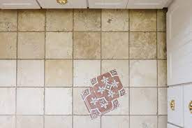 stick tile over the bathroom floor