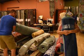 photos hadinger flooring donates rugs