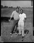 Joe Louis, Hank Thompson,NYG, posing with golf clubs on South Park ...