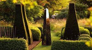 How To Use Mirrors In The Garden To