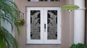 Dolphins Etched On Double Doors
