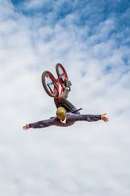 man bicycle backflip jumping