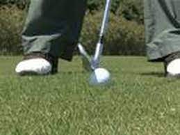 golf how to stop topping the ball