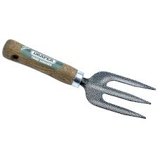 Young Gardener Weeding Fork With Ash