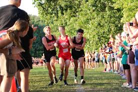 cross country runners stop their race
