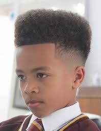 This adds a ton of volume to the style, but keeping the hair a bit shorter than normal will ensure that it doesn't start to look too much like a full afro, which is a completely different look. 85 Black Boys Haircuts For Cool Guys Perfect For 2021