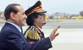 Berlusconi is a controversial figure in modern italian politics: More Photo Trouble For Berlusconi As Gaddafi Makes First Visit To Italy Italy The Guardian