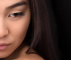 free photo half face of asian lady