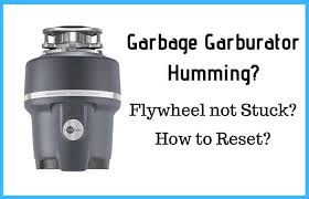 garbage disposal humming but flywheel