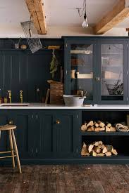 White kitchen cabinets with colorful kitchen island. 5 New Kitchen Trends We Re Seeing And Loving And Some We Re Doing Right Now Emily Henderson