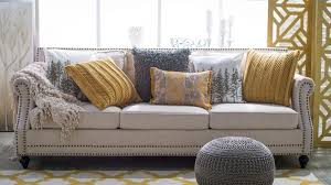 neutral sofa with throw pillows