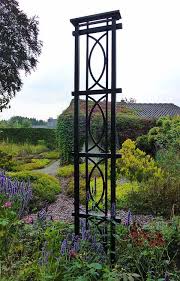 exotic metal garden obelisk in the