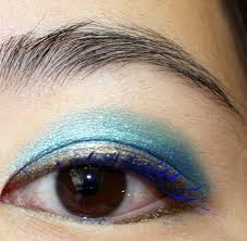blue teal and golden eye makeup