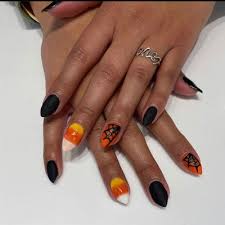 Orange is really an unusual color for a nail polish. 42 Halloween Nail Art Ideas Cute Halloween Nail Designs Allure