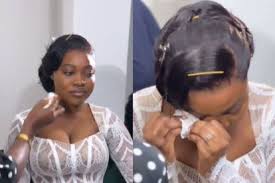 beautiful bride crying on her wedding day