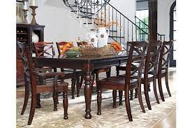 Dining sets are available in all shapes sizes heights and materials and typically include the table and at least four chairs. Ashley Furniture Dining Room Wild Country Fine Arts