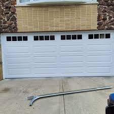 used 16x8 ins garage door w windows
