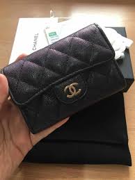Maybe you would like to learn more about one of these? Chanel 19s Iridescent Black Snap Card Holder Reetzy