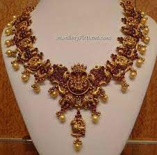 temple jewellery designs catalogue gold