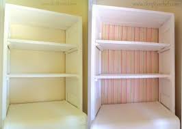 The doors slide open along a steel roller system at the top and the bottom to reveal the secret room. Diy Bifold Door And Dresser Bookcases Color Me Thrifty