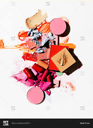 a pile of broken makeup stock photo
