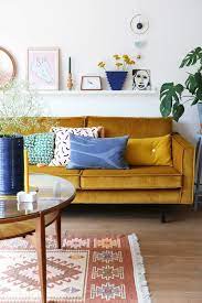 12 Rooms Where A Colorful Couch Steals
