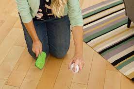 remove sticky residue from hardwood floors