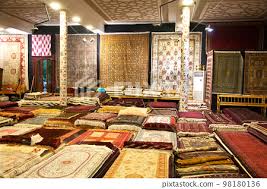 handmade silk carpets are sold in a