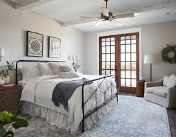 She strayed from her usual light, bright color scheme and went with a dark we've all come to know and love the modern farmhouse look popularized by joanna gaines. The Secret To Decorate Like Joanna Gaines Fixer Upper Bedrooms