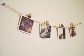 old polaroids as apartment decorations