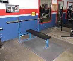 a weight bench with uprights