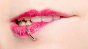 lip piercing scars causes and