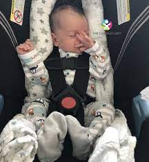 Newborn Baby S Head In The Car Seat
