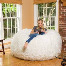 But—and this is perhaps the most genius part of the lovesac—all of the furry and customizable covers that you can choose for your deluxe bean bag chair can be thrown right into the regular washing. The Lovesac Pillow And Other Comfy Chairs To Try This Winter