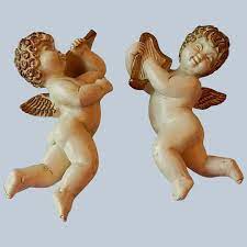 Cherub is a superpowered government agent and member of the dnangels (along with seraph and epiphany). Two Universal Statuary Cherub Angels Wall Hanging Colemans Collectibles Ruby Lane