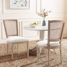 beige rattan upholstered dining chair