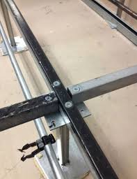 raised floor stringer bolted access
