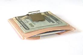 For the slimmest silhouette, a money clip keeps your paper money organized — and that's it. Money Clips Tagsmith Handmade Leather Goods
