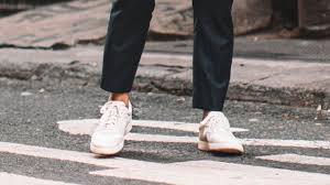 Suits with sneakers, boots or without a tie instantly make it more casual. Sneakers To Wear With A Suit